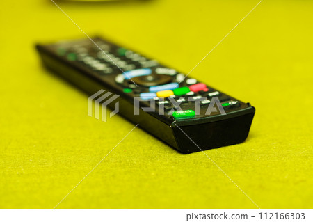 Detailed closeup of TV remote control Detailed closeup of TV remote control 112166303
