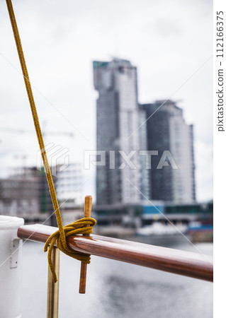 Rope tied around hook on handrail Rope tied around hook on handrail 112166375