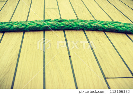 Old fashioned harbor marina sailboat ropes Old fashioned harbor marina sailboat ropes 112166383