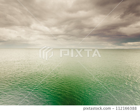 Idyllic shot of horizontal sea water and sky 112166388