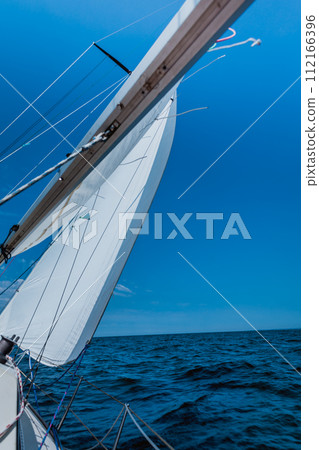 Yachting yacht sailboat sailing in sea ocean 112166396