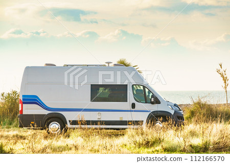 Caravan van camping on sea shore 112166570