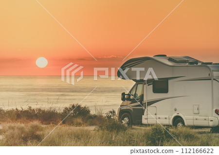 Caravan on sea at sunrise. Caravan on sea at sunrise. 112166622