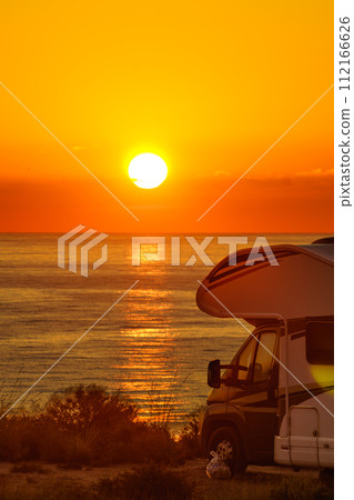 Caravan on sea at sunrise. Caravan on sea at sunrise. 112166626