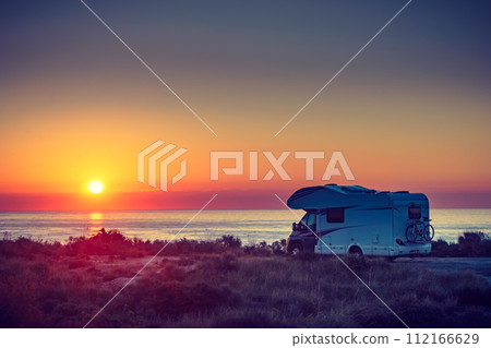 Caravan on sea at sunrise. Caravan on sea at sunrise. 112166629