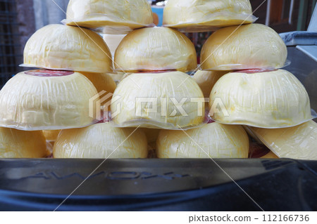 many type of cheeses on shop window many type of cheeses on shop window 112166736
