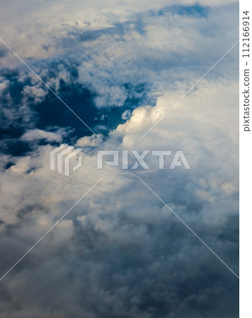 White cloudy sky. View from airplane flying in clouds. 112166914