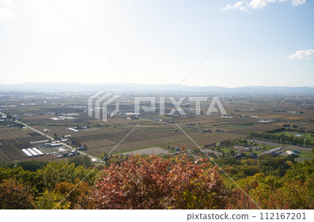 Autumn leaves and rural scenery seen from Kitousi forest in Higashikawa-cho, Kamikawa-gun, Hokkaido Autumn leaves and rural scenery seen from Kitousi forest in Higashikawa-cho, Kamikawa-gun, Hokkaido 112167201