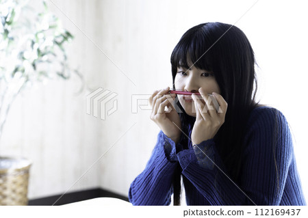 Young woman tired of studying Young woman tired of studying 112169437