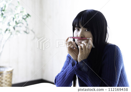 Young woman tired of studying Young woman tired of studying 112169438