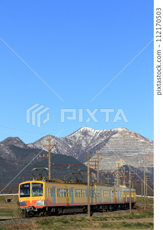 Mt. Fujiwara and Sangi Railway Sigi Line in winter Mt. Fujiwara and Sangi Railway Sigi Line in winter 112170503