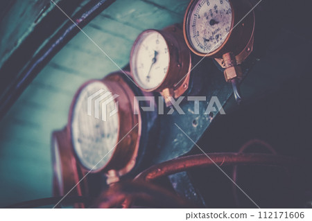 Image of old steam engine equipment 112171606