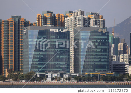 the hotel and office building at coastline, hong kong Jan 13 2024 112172870
