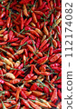 Close up of red hot chili peppers at the market  112174082