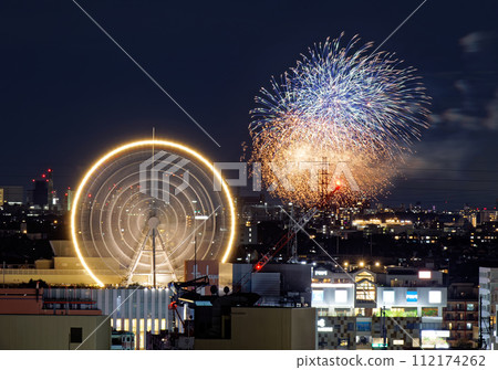 Tama River fireworks and Ferris wheel seen from Kohoku New Town 112174262