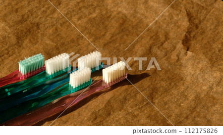 This is a used toothbrush or plastic product whose bristles have spread out. 112175826