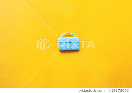 blue women's handbag, shopping accessories concept 112178052
