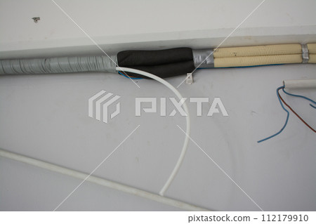 air conditioner drain hose with insulation. indoor unit. air conditioner drain hose with insulation. indoor unit. 112179910