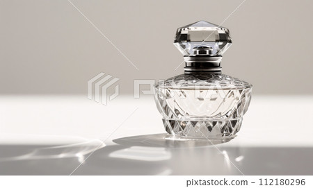 an elegant perfume bottle, glimmering with sophistication an elegant perfume bottle, glimmering with sophistication 112180296