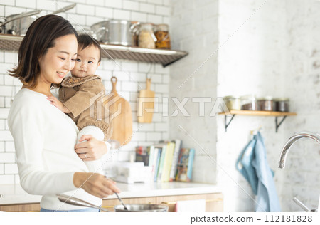 mom and baby cooking 112181828