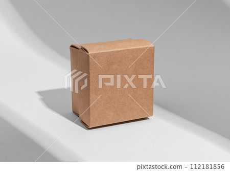 Kraft carton box cover mockup, square shape, small little mini cardboard package 112181856