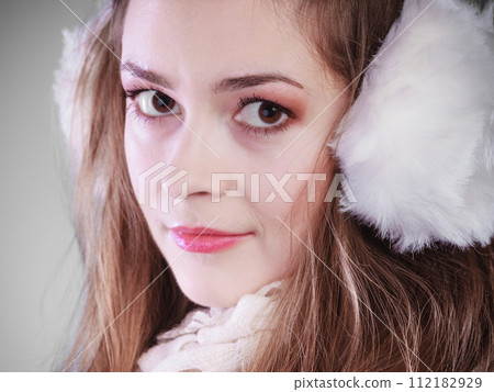 Young woman in wintertime. Young woman in wintertime. 112182929