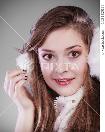 Young woman in wintertime. Young woman in wintertime. 112182932