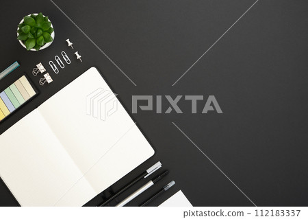 Banner with black, white and gray school and office stationery and note on black background. Flatly, copyspace. 112183337