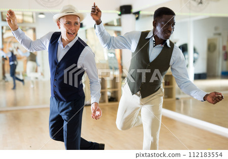 Two professional dancers practicing lindy hop in dance class 112183554