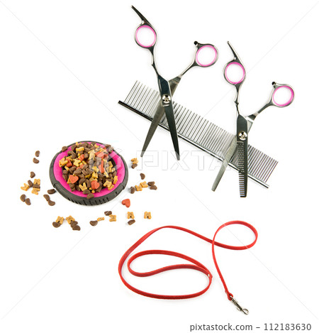 Pet accessories concept. Dry food, Scissors, comb and leash for pet on isolated white. Collage. 112183630