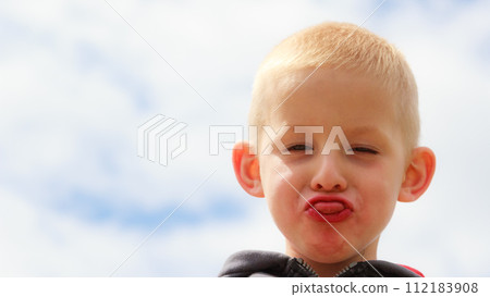 Child kid making silly face. Childhood. 112183908