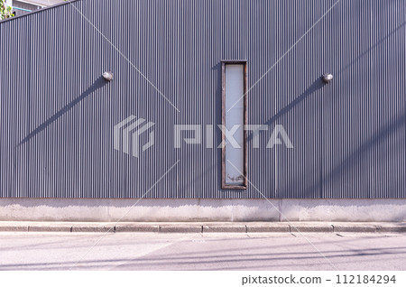 street wall background ,Industrial background, empty grunge urban street with warehouse brick wall street wall background ,Industrial background, empty grunge urban street with warehouse brick wall 112184294