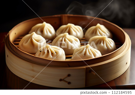 Steamed baozi dumplings chinese ansian food, bamboo steamer 112184595