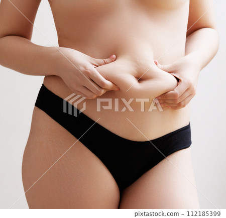 Natural Real woman body. Moms postpartum body with Natural Real woman body. Moms postpartum body with 112185399