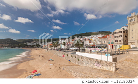 Panorama showing aerial view of Sesimbra Town and seaside timelapse, Portugal. 112186324