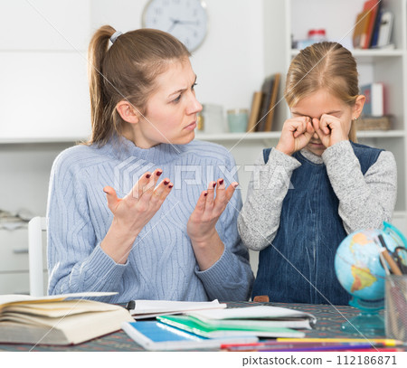 Woman complaining about her daughter 112186871