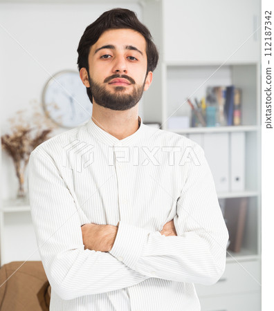Portrait of young cheerful businessman Portrait of young cheerful businessman 112187342