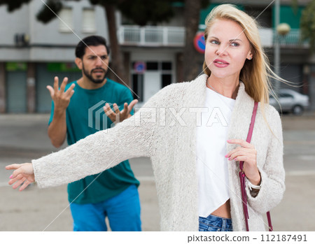 Couple is quarrelling because of the disagreements between them Couple is quarrelling because of the disagreements between them 112187491