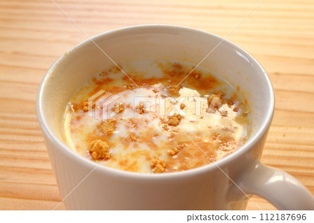 Powdered soybean milk with soybean flour floating on top Powdered soybean milk with soybean flour floating on top 112187696
