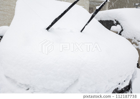 Car buried in snow Car buried in snow 112187738
