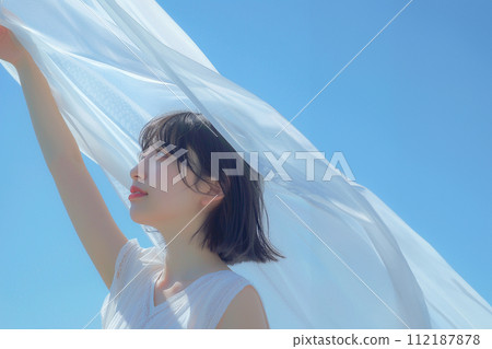 AI-generated image of a young woman standing holding a white cloth towards the sky 112187878
