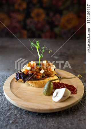Hearty open-faced sandwich with beef tenderloin, mushrooms and... Hearty open-faced sandwich with beef tenderloin, mushrooms and... 112189487