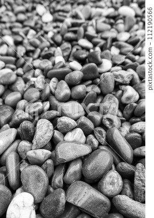 Wet eroded stones 112190566