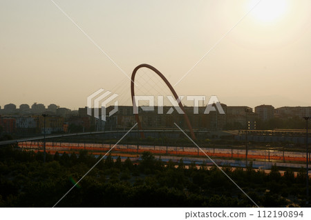 TURIN, ITALY - 14 SEP 2019: Impressive arch bridge for pedestrians in Turin 112190894