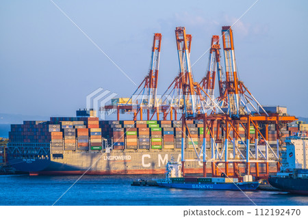 Yokohama, Japan cityscape Container ship docked at Honmoku Pier = March 3rd Yokohama, Japan cityscape Container ship docked at Honmoku Pier = March 3rd 112192470