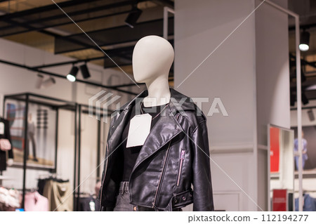 Female mannequin in gray jacket close up Female mannequin in gray jacket close up 112194277