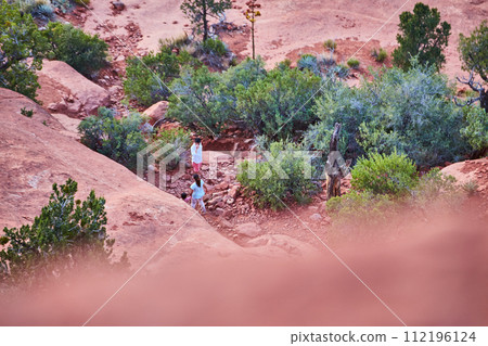 Hiking Adventure in Sedona's Red Rocks, Elevated View Hiking Adventure in Sedona's Red Rocks, Elevated View 112196124