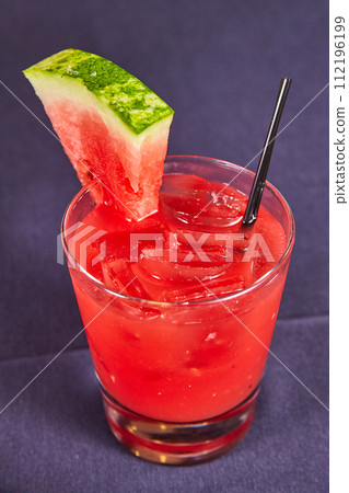 Vibrant Watermelon Cocktail with Fresh Garnish, Close-Up 112196199