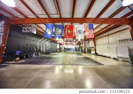 Spacious Gym with Crossfit Zone and Patriotic Flags, Wide Angle View Spacious Gym with Crossfit Zone and Patriotic Flags, Wide Angle View 112196223