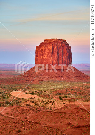 Monument Valley Butte at Golden Hour, Warm Desert Landscape 112196271